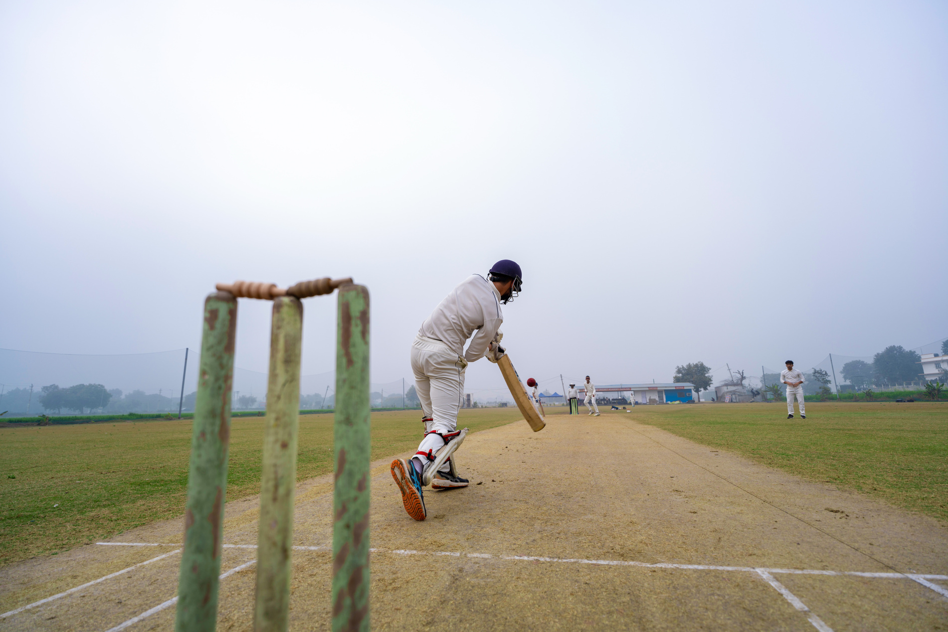 Man Playing Cricket Batting